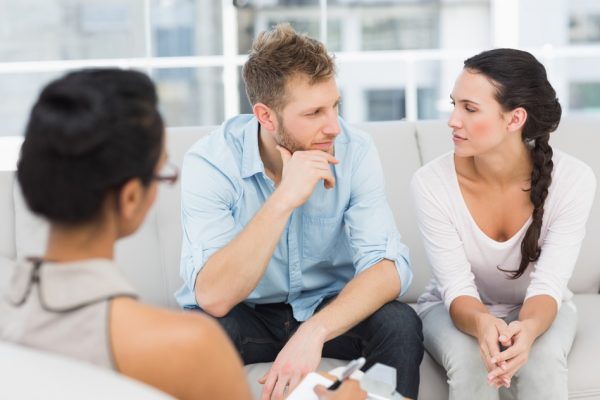 photodune-8574390-unhappy-couple-at-therapy-session-in-therapists-office-s_0